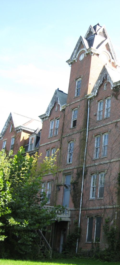 Captivating view of Cincinnati skyline with bridge reflections on Ohio River at night.