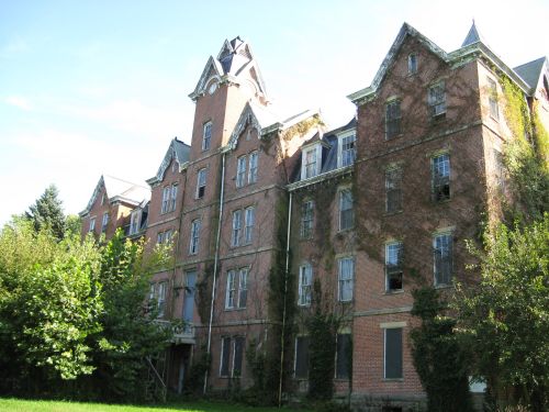 Captivating view of Cincinnati skyline with bridge reflections on Ohio River at night.